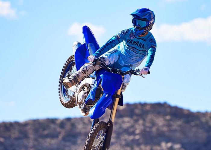 Yamaha YZ450f dirt bike landing a jump jump