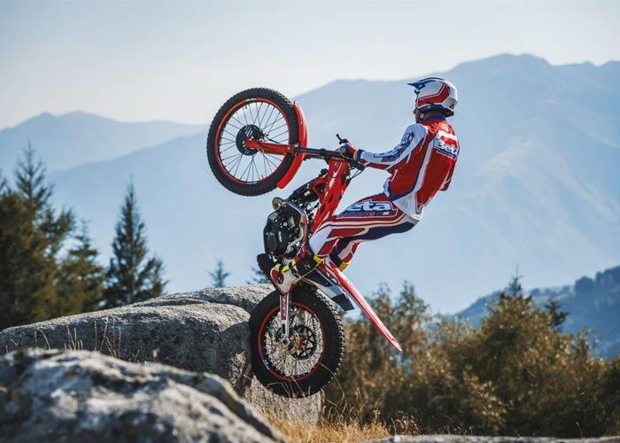 Motorbike Trials rider on obstacles.